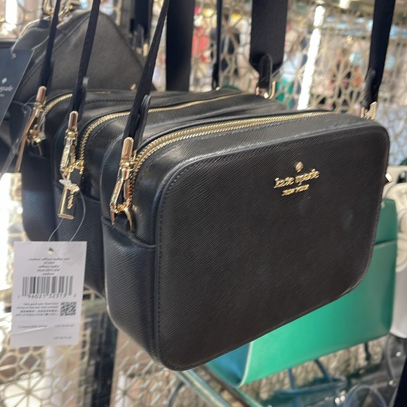 Kate Spade Madison Mini Camera Bag
COLOR:
Black 
NWT - Picture 15 of 16